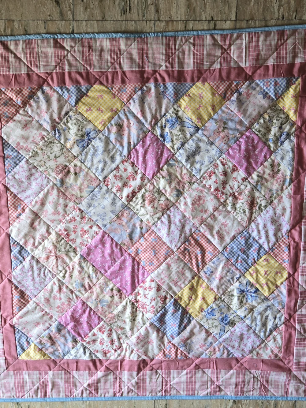 Vintage-Inspired Patchwork Quilt in Pink and Pastels